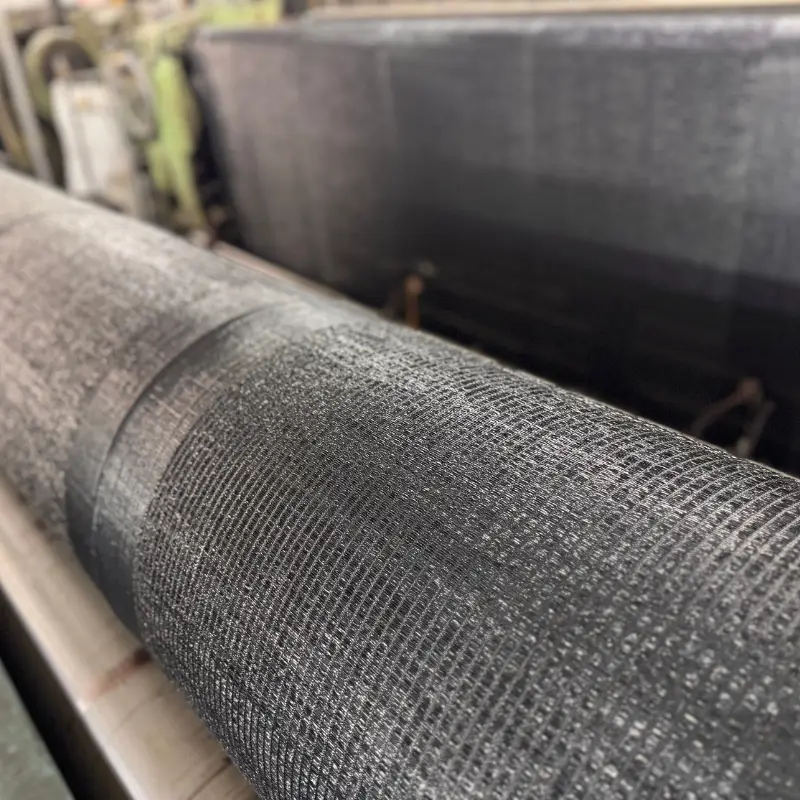 A close-up macro shot of the heavy-duty woven HDPE texture, showing its tight weave and quality.