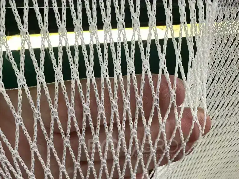 A heavy-duty loom at the EyouAgro factory weaving thick, 60gsm bird netting.