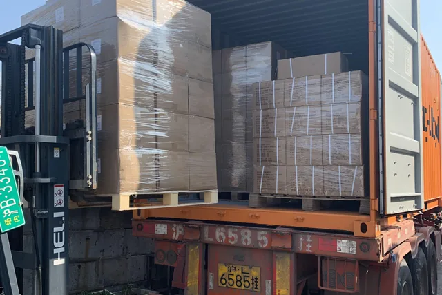 Netting cartons loaded in an export container at the EyouAgro factory